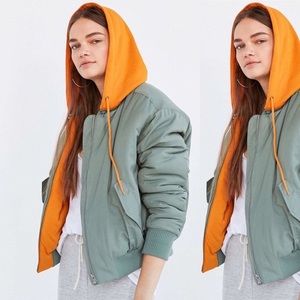 army green and orange hooded bomber